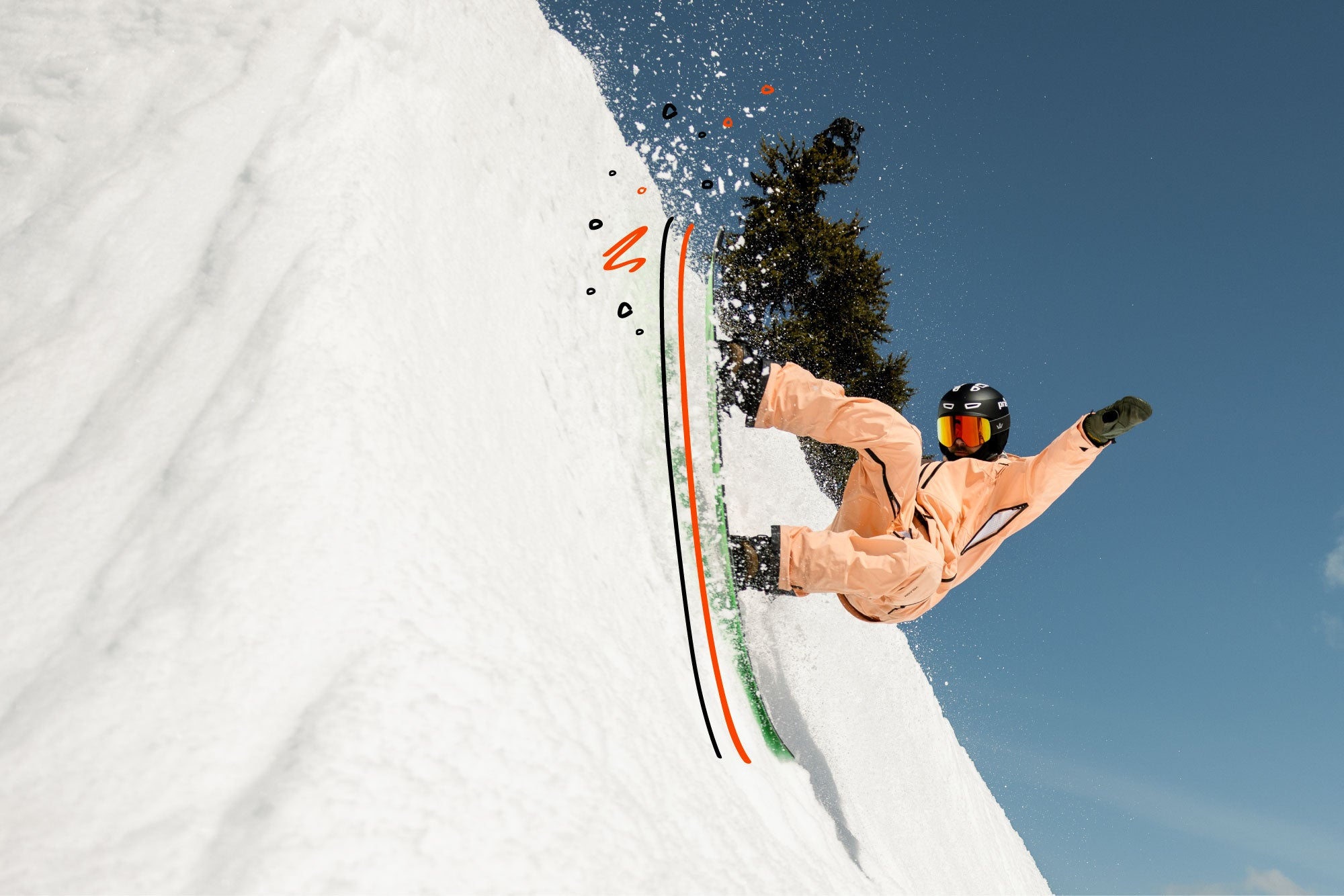 person snowboarding on the side of a steep incline