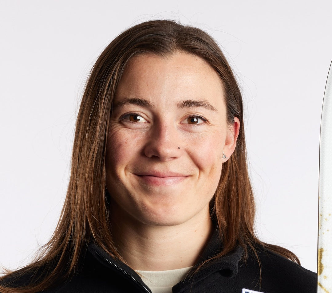 Jaelin Kauf with long brown hair wearing a black hoodie against a white background
